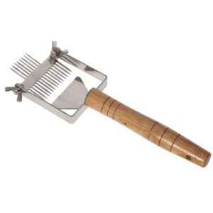 Raspador APIMAX® para raspar la cera de los bordes de los cuadros de panal y asegurar que la miel fluya libremente durante la extracción.